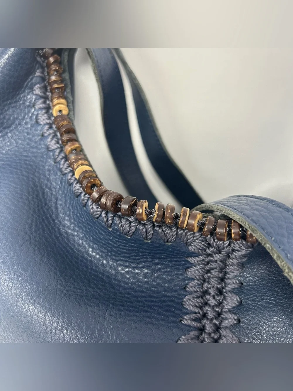 The Sak Boho Leather Hobo Bag slouchy with Beaded Trim and Tassel charm Blue